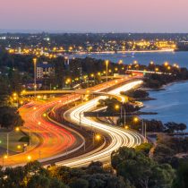 Evening Traffic along the Kwinana Freeway next to the Swan River in Perth, Western Australia.